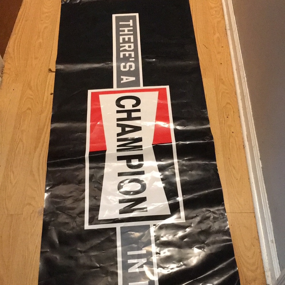 There’s a Champion in Here sign
